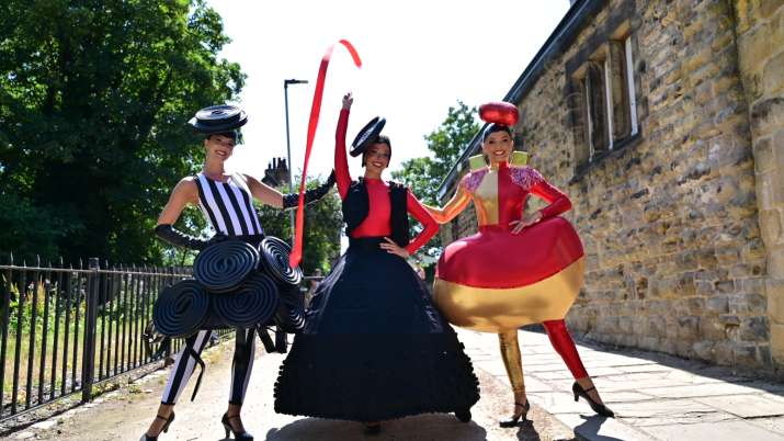 Parade performers pose at the iconic Pontefract Castle