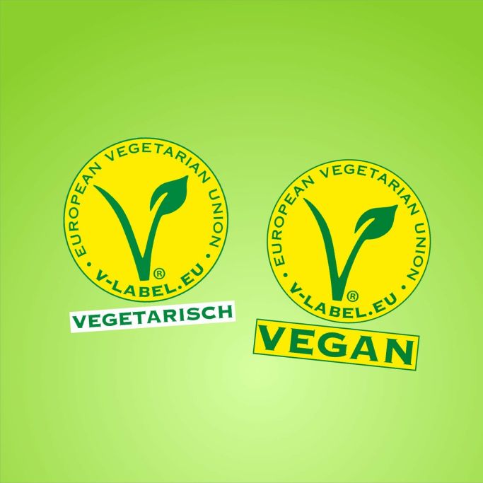 Vegetarisch und Vegan Labels in gelb auf grünem Hintergrund