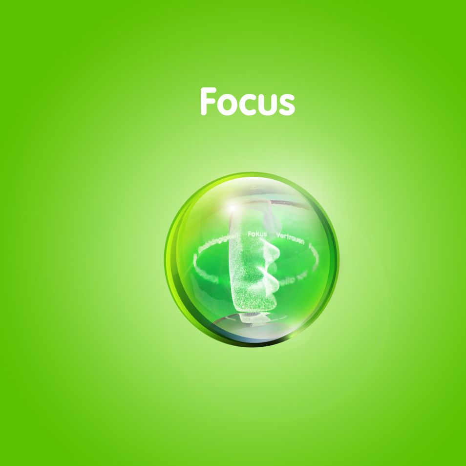 Graphic with Goldbear in transparent ball against green background with text: “Focus”