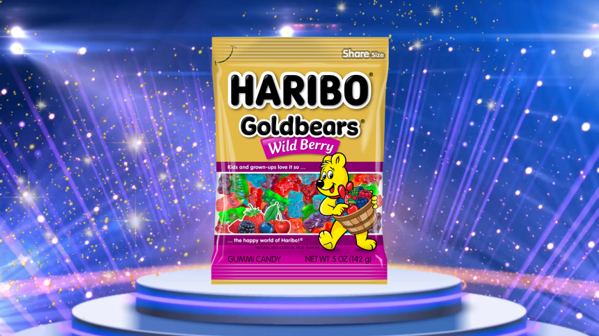 A bag of Wild Berry Goldbears is featured on a podium with sparkling lights behind it