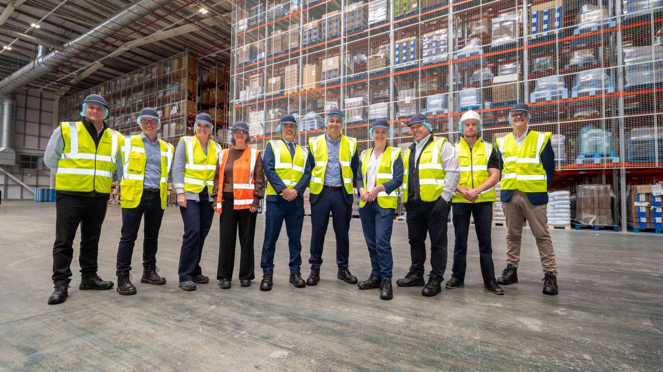 Group photo taken inside the new HARIBO warehouse.
