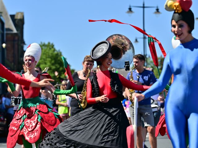 Dancers in HARIBO themed costumes parade around Pontefract