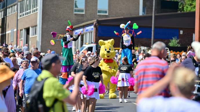The iconic HARIBO Goldbear mascot takes part in the parade.