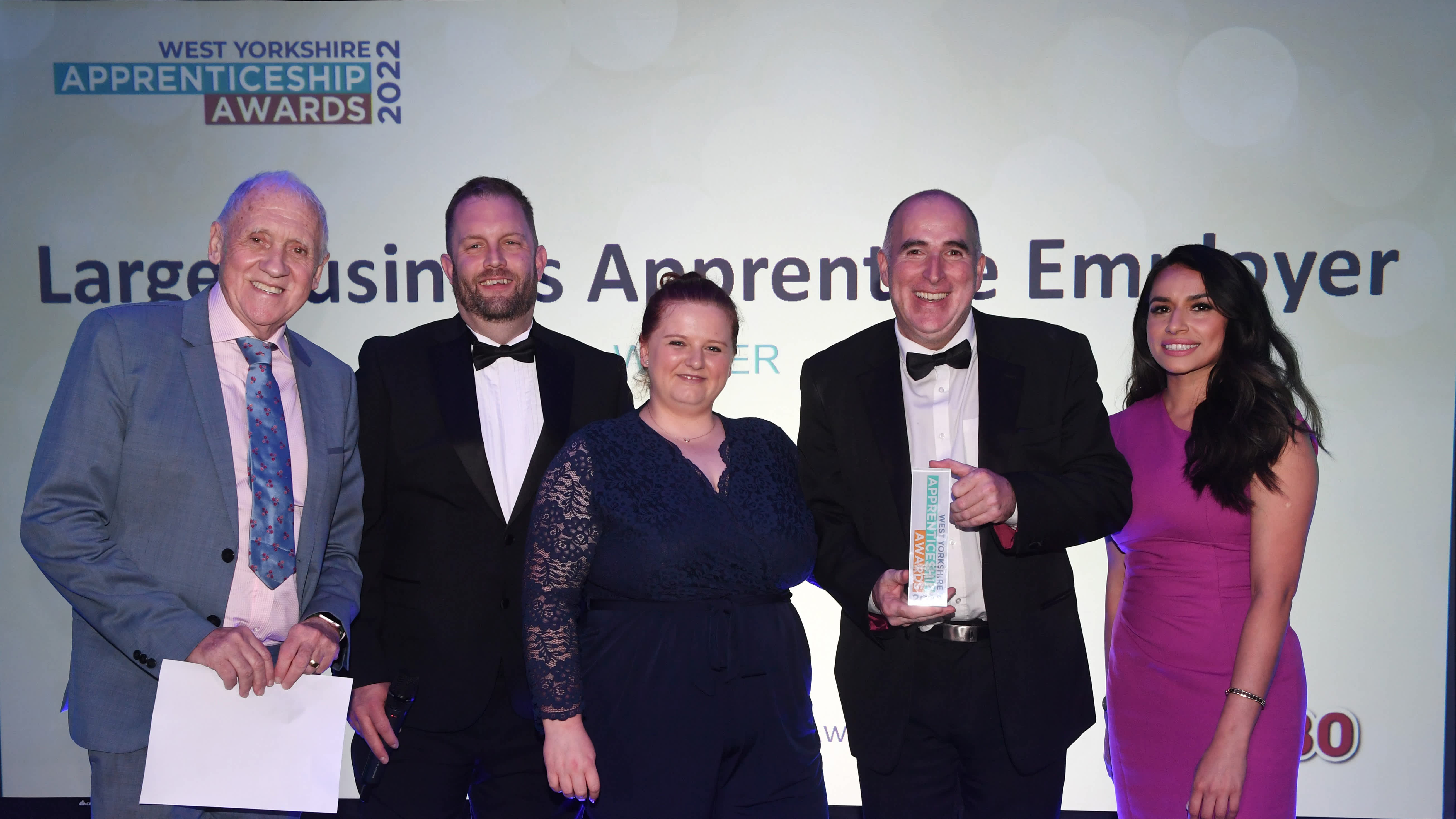 A group of people display their West Yorkshire Apprenticeship Award.