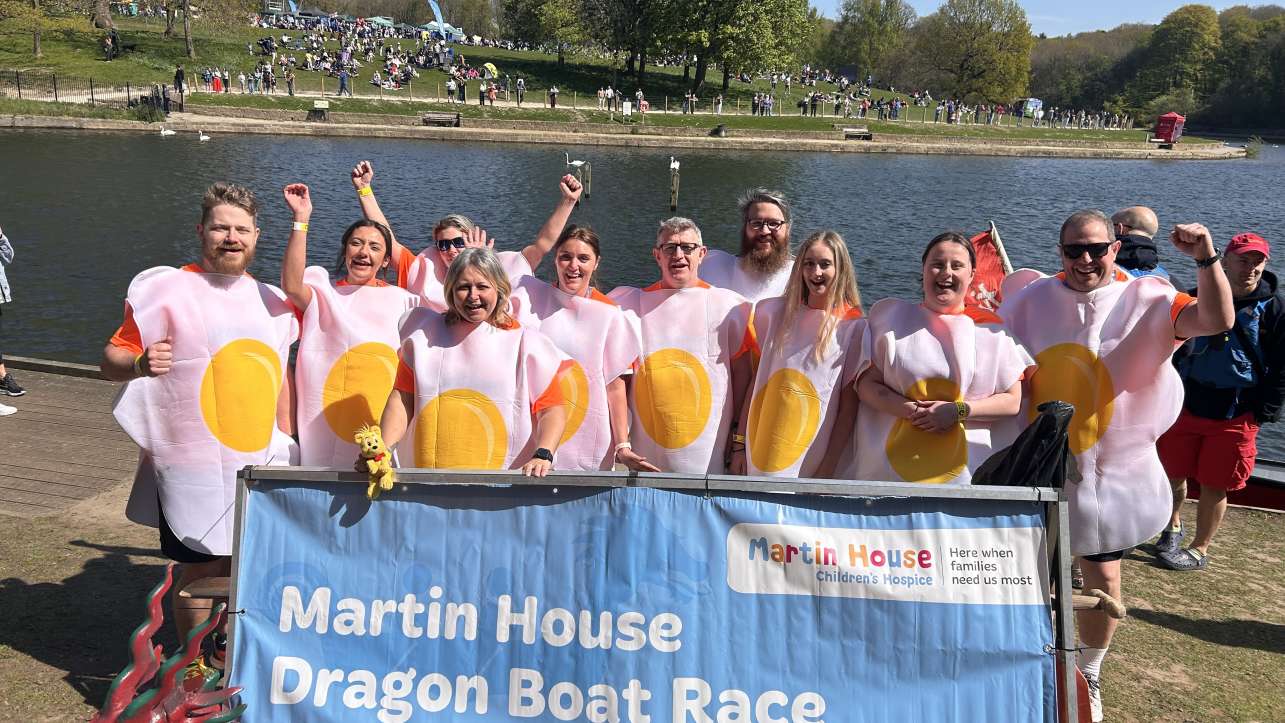 Rowing team dressed as Fried Eggs celebrate.