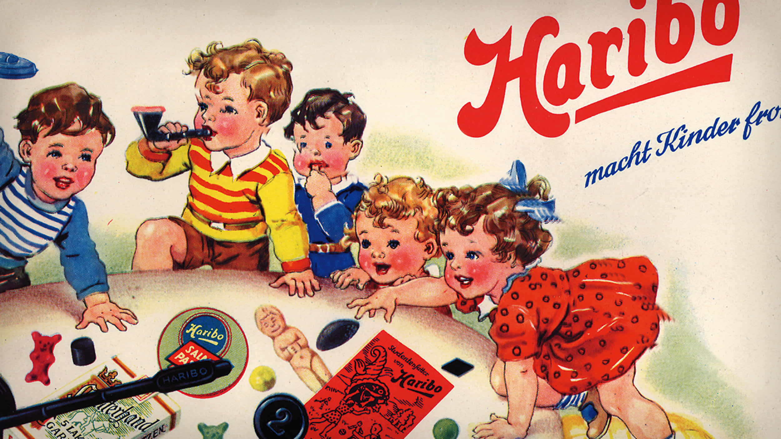 Historisk reklameannonse fra HARIBO, barn leker med gummibjørner og lakris