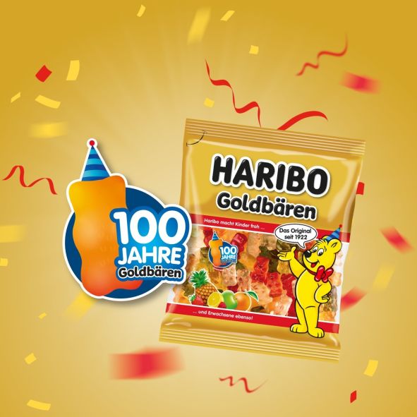 HARIBO Goldbären mit 100 Jahre Störer auf goldenem Hintergrund