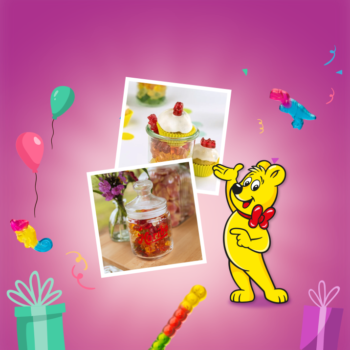 A colorful website header for HARIBO's guide to the best candy bar ideas for any celebration. The pink gradient background features balloons, confetti, and floating gummy bears. Two Polaroid-style photos showcase creative candy table ideas — one displaying cupcakes topped with gummy bears in decorative jars as a charming diy candy bar setup, and the other showing a glass jar filled with HARIBO gummy bears alongside fresh flowers for a rustic candy bar wedding or party look. The HARIBO Goldbear stands beside the photos.