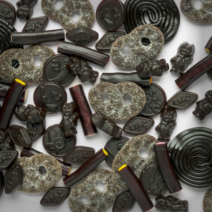 Lots of different liquorice products on a light background