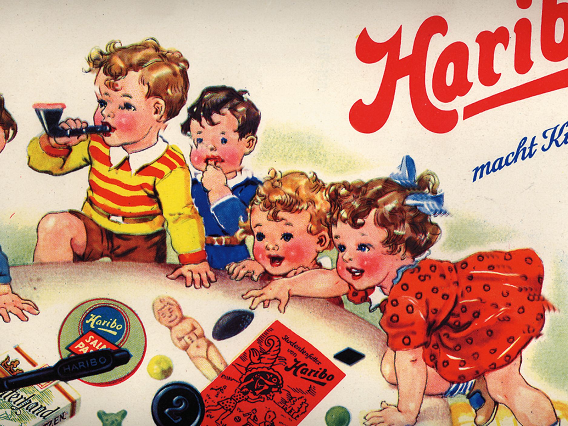 Propaganda antiga da HARIBO: crianças brincando com ursinhos de gelatina e balas de alcaçuz
