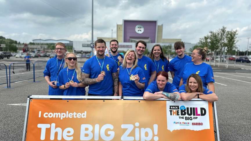 Members of the HARIBO team pose infront of Xscape Castleford having completed the zipline.